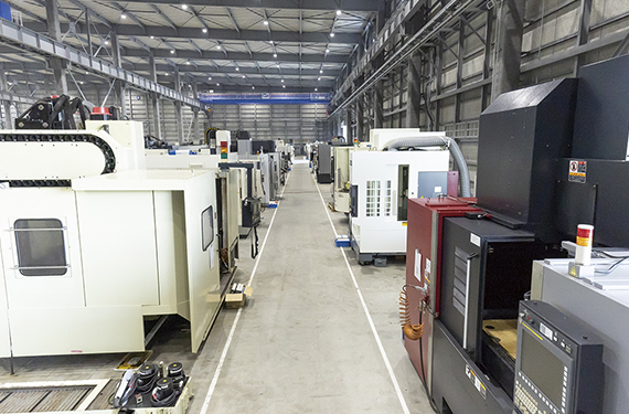 More vertical machining centers are sold than any other type of machine. They are displayed at intervals so that prospective buyers can walk around each machine for a 360° appraisal.